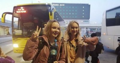 Edinburgh Airport greets 50 Ukrainian orphans after they were rescued by Hibs fans