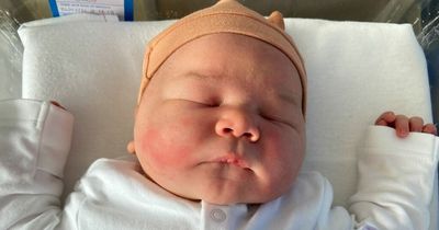 Mum gives birth to baby weighing an incredible 11lbs 8oz which has doctors joking he is 'ready for school'