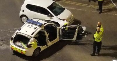 Driver injured after police car crashes into VW on way to Leeds emergency call