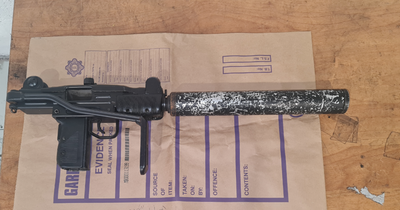 Submachine gun and ammo seized by gardai from stolen jeep in Greenhills