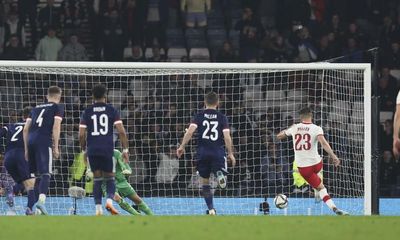 Piatek’s late penalty denies Scotland win over Poland on poignant night