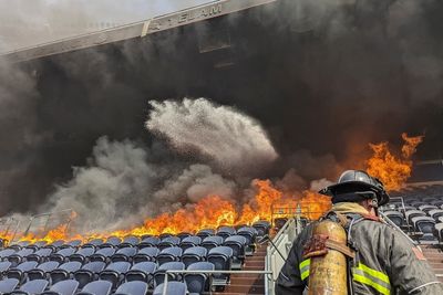 Denver Broncos stadium fire torches seats, suite area