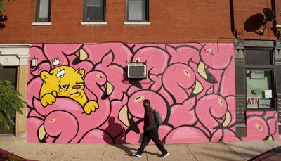 Near West Side mural features flamingos — and one beleaguered looking bear