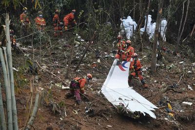 China jet crash mystery deepens as evidence suggests midair breakup