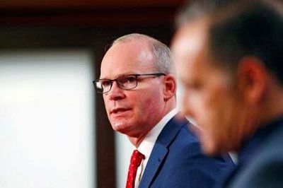 Irish Foreign Minister Simon Coveney taken off stage in Belfast after ‘suspicious device discovered in hijacked van’