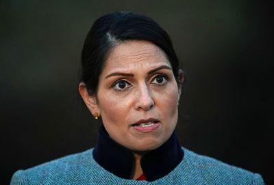 Priti Patel breached human rights with unlawful policy of seizing asylum seekers’ phones, court rules