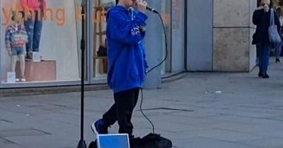 Busker, 11, wows shoppers with amazing singing voice