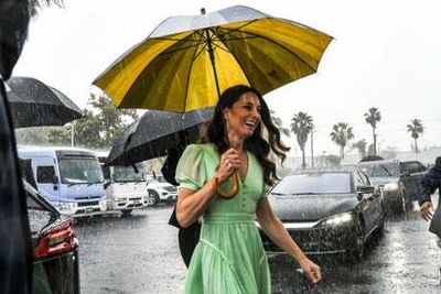 ‘We’ve brought England’s rain with us!’: Duchess of Cambridge jokes about weather as she visits school in Bahamas