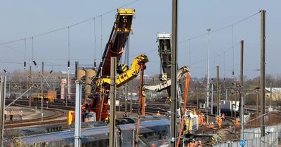 Two cranes used to move train three days after it derailed in Heaton