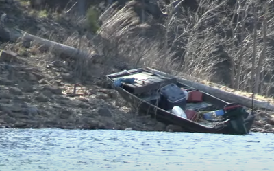 Two children aged five and 10 found dead wearing lifejackets near boat on Arkansas lake