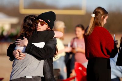 Mourners gather for a vigil for 6 girls killed in crash