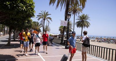 Why are Irish people being asked to 'exercise a high degree of caution' in Spain, Portugal and other tourist hotspots?
