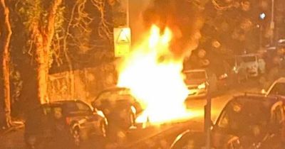 'Large explosions' on Cardiff street as fire burns through cars