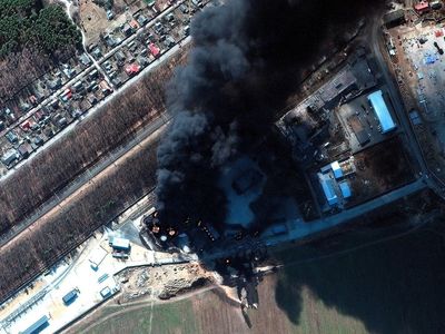 Satellite images show sky turned black by thick smoke after Russian bombing of fuel depot near Kyiv