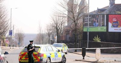 Woman arrested by police investigating hijacking and bomb hoax at Simon Coveney peace event in Belfast