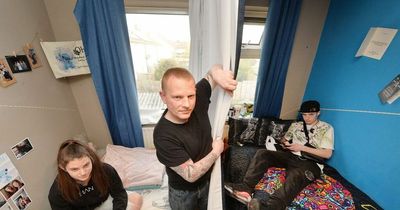 Dad forced to use curtain to divide room for his kids as he battles with council