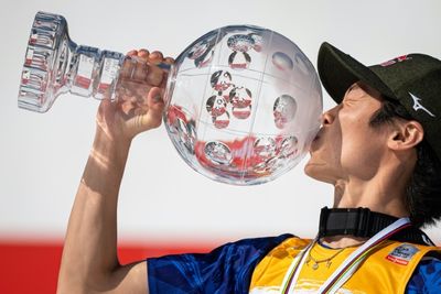 Kobayashi clinches World Cup crown in season finale