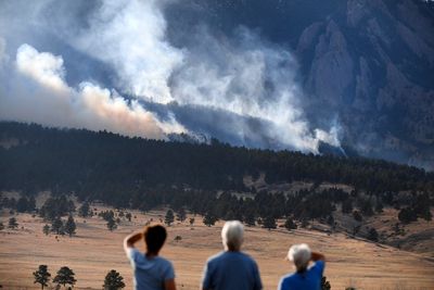 Officials lift most evacuation orders on Colorado wildfire