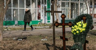 Ukraine war: Mariupol streets become cemeteries as victims buried under makeshift graves