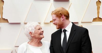 Dame Judi Dench turns heads at 2022 Oscars with 'Ed Sheeran lookalike' grandson