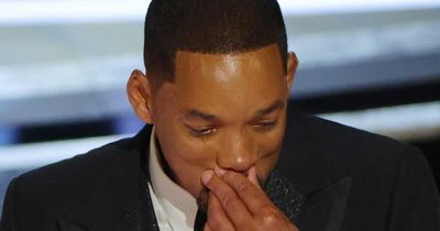 Tearful Will Smith explains attack on Chris Rock saying 'love makes you do crazy things'