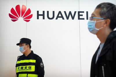 China's Huawei says 2021 sales down, profit up