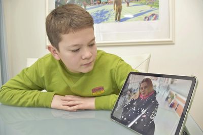 Boy who fled from Ukraine worries about his mother
