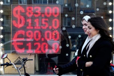 Russian stocks slide as trading resumes for all companies