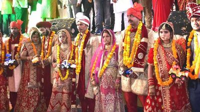 Uttar Pradesh: Now, couples gifted bulldozer toys in mass wedding in Prayagraj