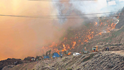 Delhi’s mountain of shame spews fire, venom again...
