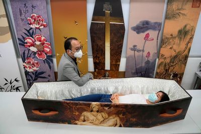 Hong Kong's COVID toll leads some to eco-friendlier coffins
