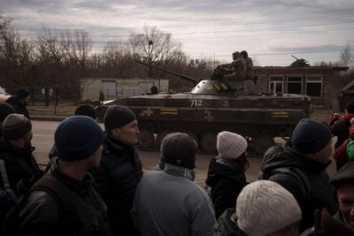 After Russian forces pull back, a shattered town breathes