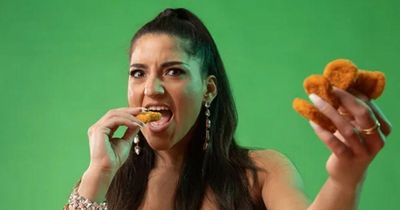 Woman sets new world record by scoffing most chicken nuggets in a minute