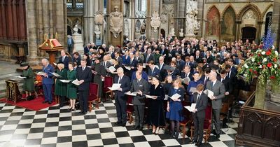 Queen arrives at Prince Philip's memorial at Westminster Abbey supported by Royal Family