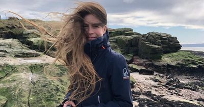 Woman rescues bird and nurses it back to health by letting it nest in her hair