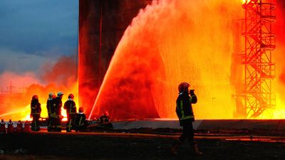 VIDEO: Heat Of Battle: Ukrainian Firefighters Face Fuel Depot Inferno In Russian Blitz