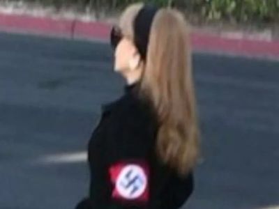 Woman wearing Nazi armband faces possible hate crime charges after brawl with elderly Jewish man