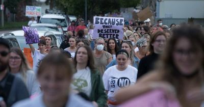 Rally demands action on domestic violence