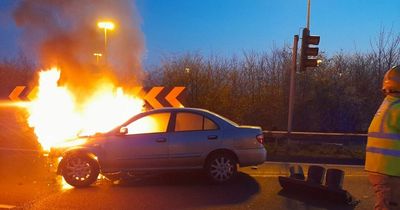 Car crashes into Dublin Airport traffic light and bursts into flames as driver does a runner