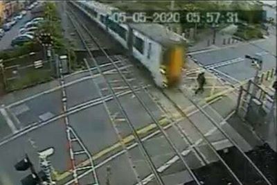 Watch: Terrifying moment man nearly gets hit by train in north London