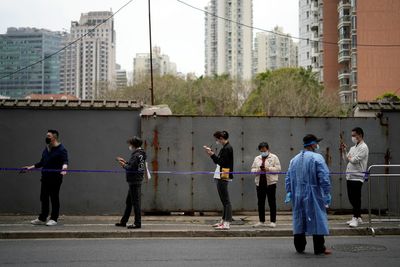 Shanghai to expand lockdown to most residents as COVID cases rise