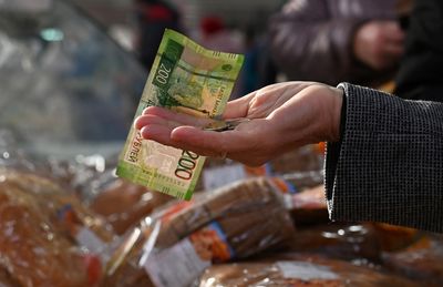 Russia’s economy projected to shrink by 10%; Ukraine’s by 20%