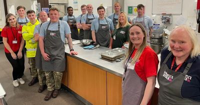 Generous soldiers volunteer to serve food at The People’s Kitchen after trek along Hadrian's Wall