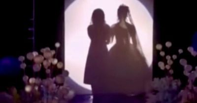 Bride's theatrical wedding entrance divides opinions as she ditches tradition