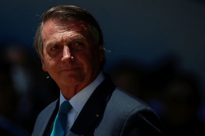 Brazil's Bolsonaro releases ministers in move to bolster re-election bid