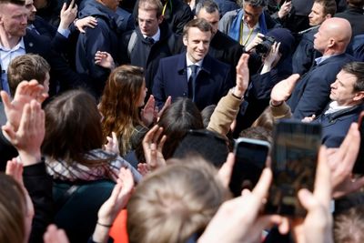 Macron attacks Le Pen as lead slips in French polls