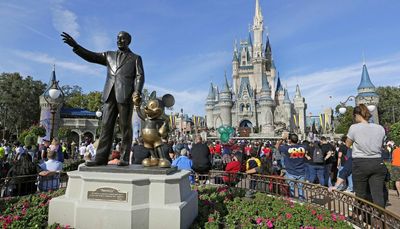 Character hugs returning to Disney parks, cruises