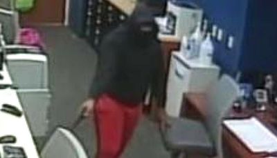 Robber pistol-whipped and choked people inside Little Village bank: FBI