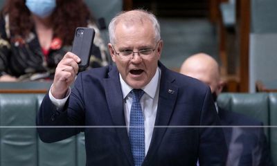 Scott Morrison must reveal any text messages from QAnon friend, information watchdog orders