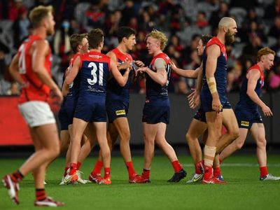 Melbourne hold off brave Bombers in AFL